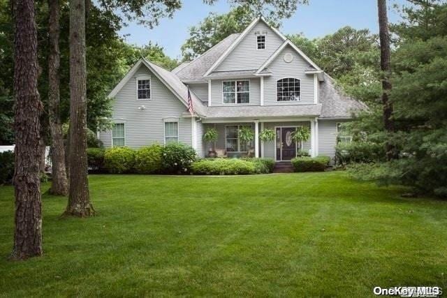 view of front of home with a front yard