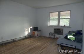 interior space with hardwood / wood-style flooring