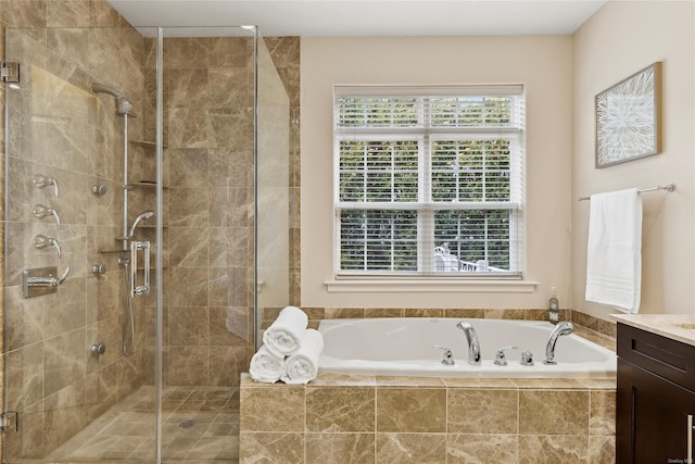 bathroom featuring vanity and plus walk in shower