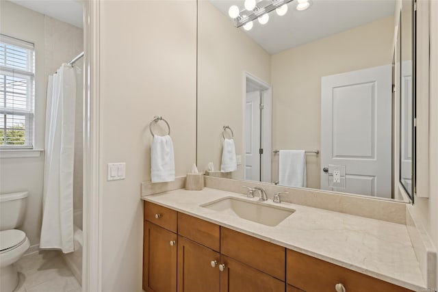 full bathroom with tile patterned flooring, vanity, shower / tub combo, and toilet