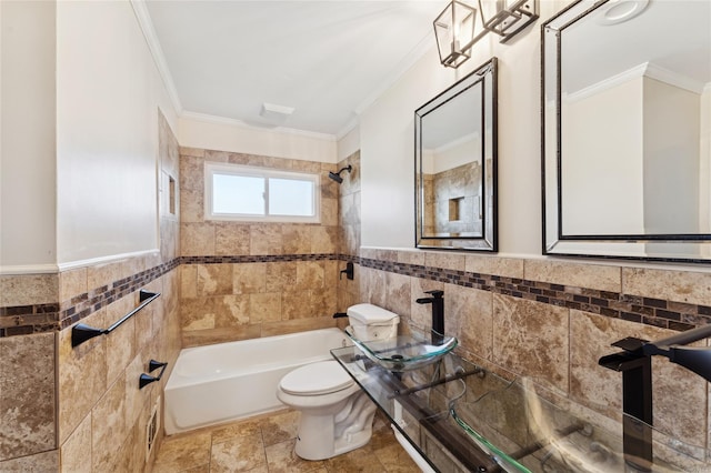 bathroom with tile walls, crown molding, tiled shower / bath combo, and toilet