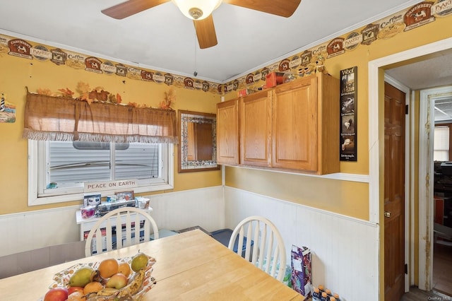 dining room with ceiling fan