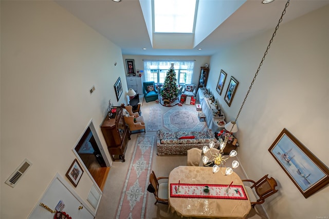811 Spring Lake Dr Unit 811, Middle Island, NY 11953 - living area with a high ceiling, recessed lighting, and a skylight