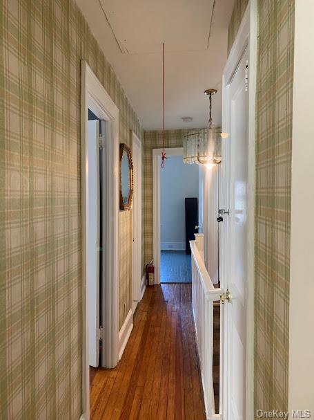 hall featuring hardwood / wood-style flooring