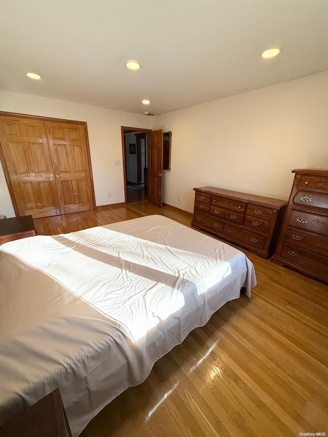 bedroom featuring light wood-type flooring