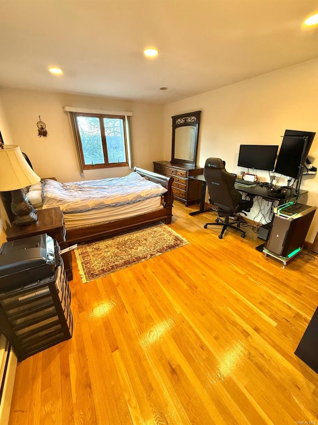 bedroom featuring light hardwood / wood-style floors