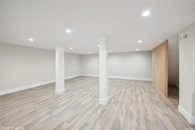 basement featuring light hardwood / wood-style floors