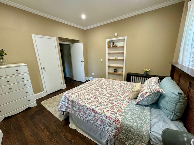 bedroom featuring dark hardwood / wood-style flooring and ornamental molding