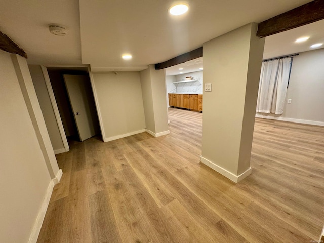 unfurnished room with light hardwood / wood-style flooring