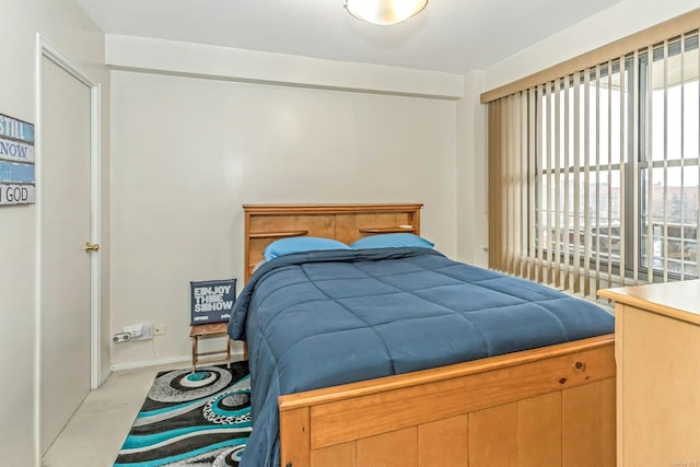 bedroom with light carpet