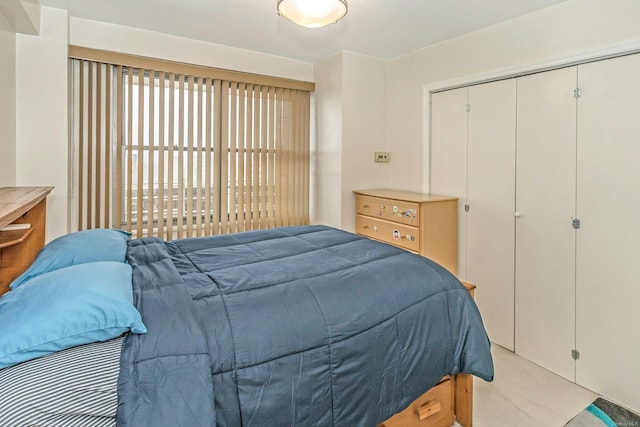 carpeted bedroom featuring a closet