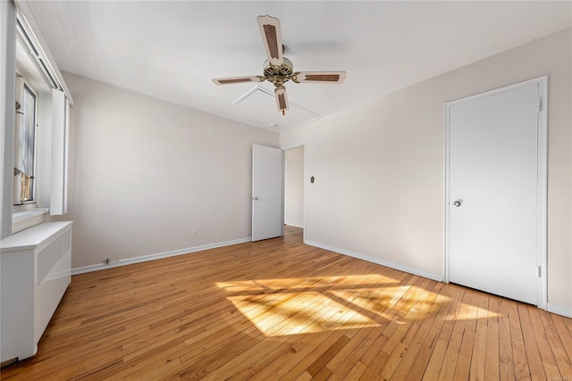 unfurnished bedroom with light hardwood / wood-style flooring and ceiling fan