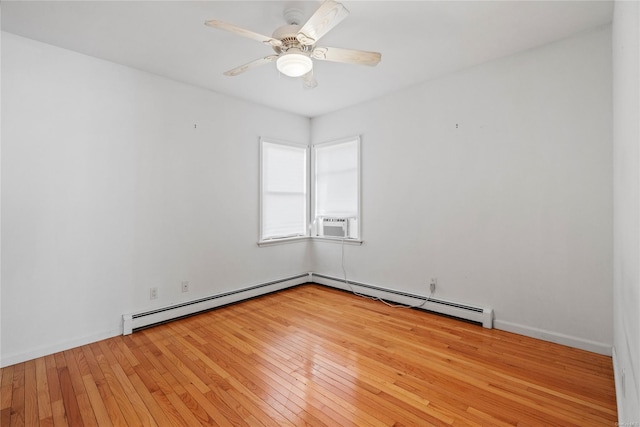 unfurnished room with light wood-type flooring, ceiling fan, and a baseboard heating unit