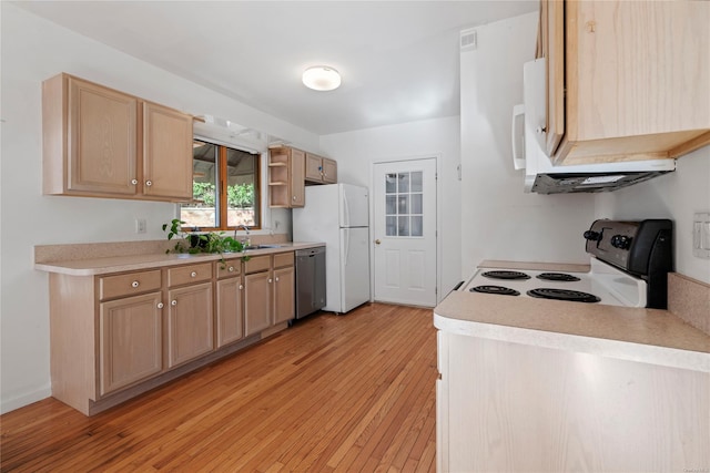 kitchen featuring light brown cabinets, white appliances, sink, and light hardwood / wood-style flooring