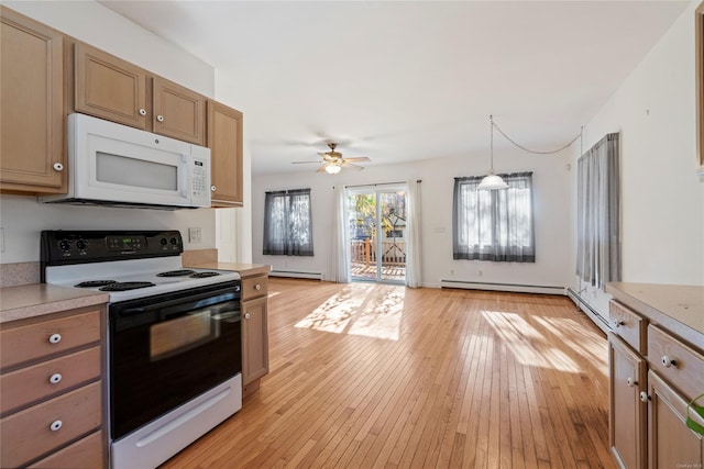 kitchen featuring white appliances, baseboard heating, ceiling fan, pendant lighting, and light hardwood / wood-style floors