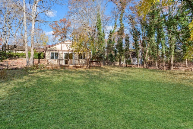 view of yard featuring a deck