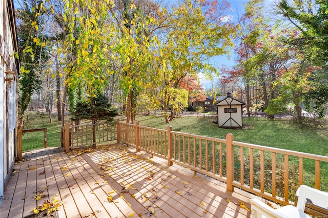 wooden deck with a lawn and a shed