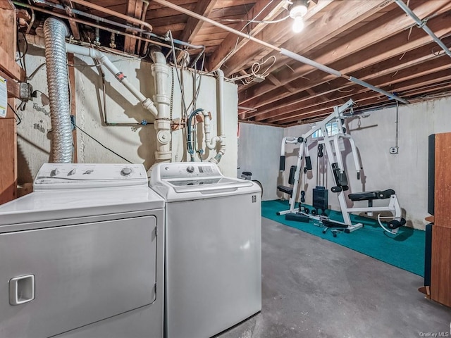 laundry room with independent washer and dryer