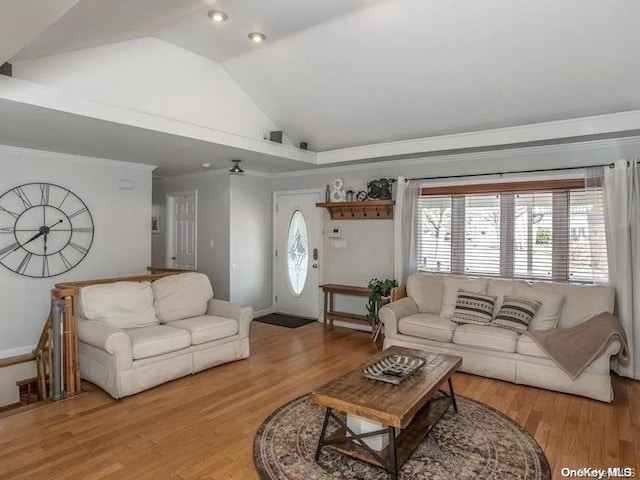 living room with light wood-type flooring, vaulted ceiling, and ceiling fan