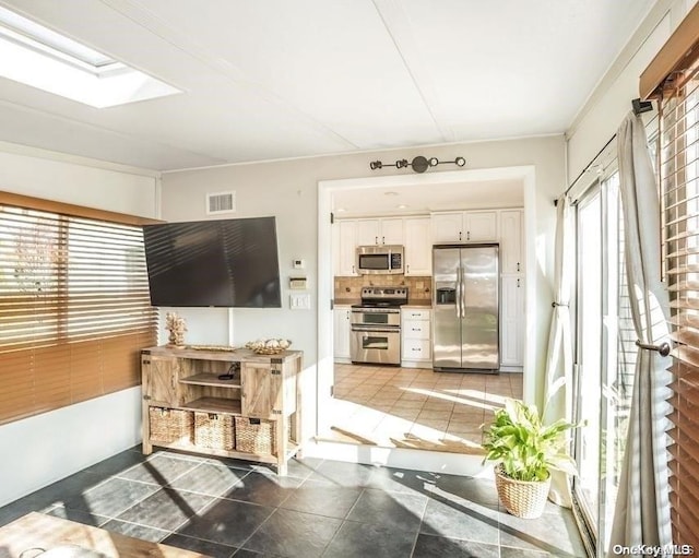 living room with a skylight