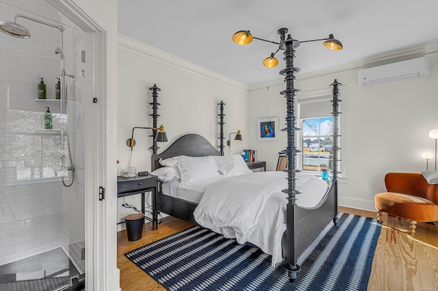 bedroom featuring wood-type flooring, an AC wall unit, and crown molding