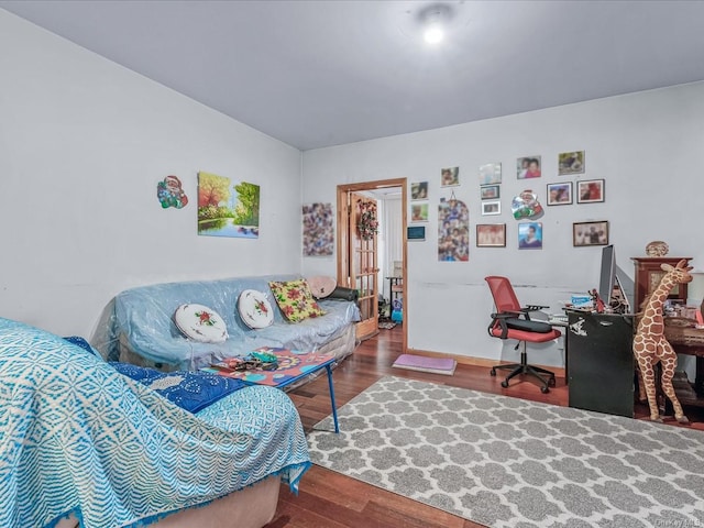 bedroom featuring wood-type flooring