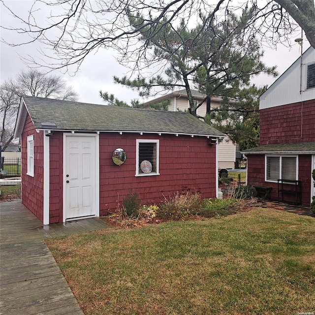 view of outdoor structure with a yard