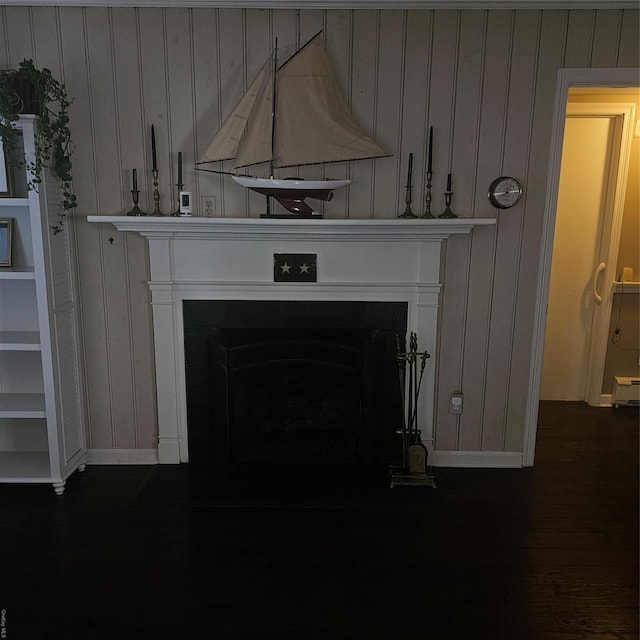 124 Mayhew Ave, Babylon, NY 11702 - detailed view of wood finished floors and a fireplace