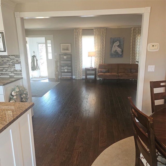 living room with dark wood-type flooring