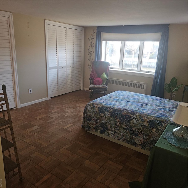 124 Mayhew Ave, Babylon, NY 11702 - bedroom featuring radiator and baseboards