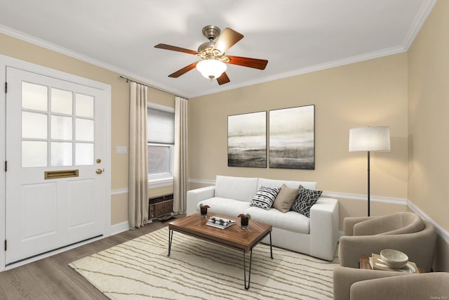 21 S Village Ave Unit 3, Rockville Centre, NY 11570 - living area featuring baseboards, ornamental molding, a ceiling fan, and wood finished floors