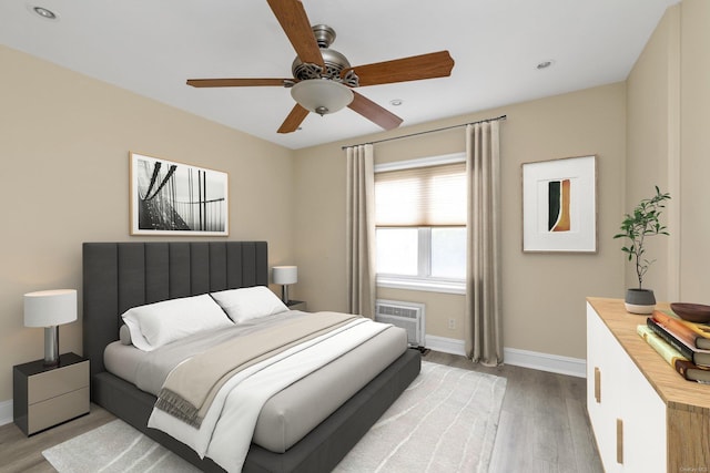 21 S Village Ave Unit 3, Rockville Centre, NY 11570 - bedroom featuring baseboards, a ceiling fan, and light wood finished floors