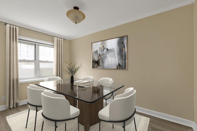 21 S Village Ave Unit 3, Rockville Centre, NY 11570 - dining space with baseboards and wood finished floors