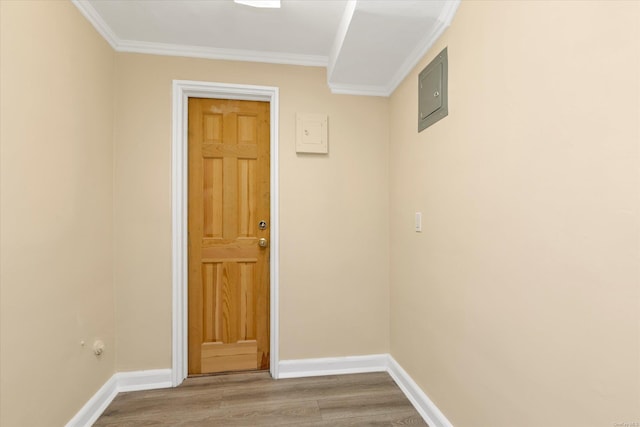 21 S Village Ave Unit 3, Rockville Centre, NY 11570 - interior space featuring baseboards, ornamental molding, wood finished floors, and electric panel