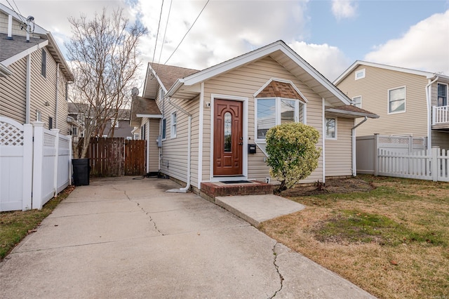 bungalow with a front yard