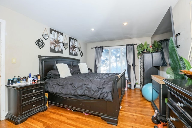 bedroom featuring light hardwood / wood-style flooring