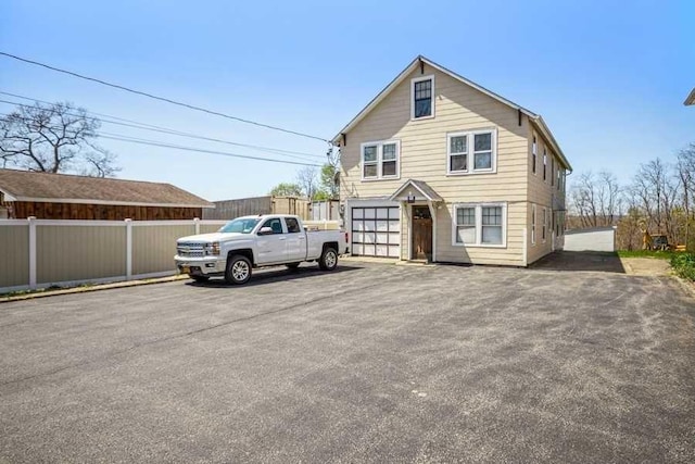 view of property featuring a garage