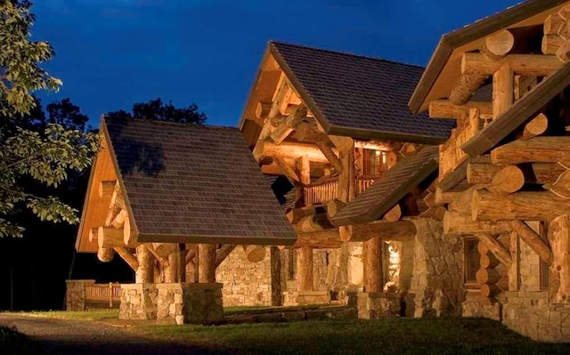 view of property exterior at twilight