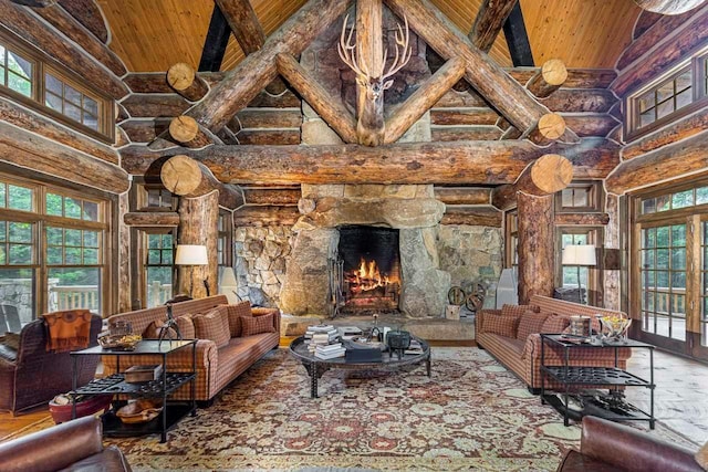 living room featuring a fireplace, a towering ceiling, and log walls