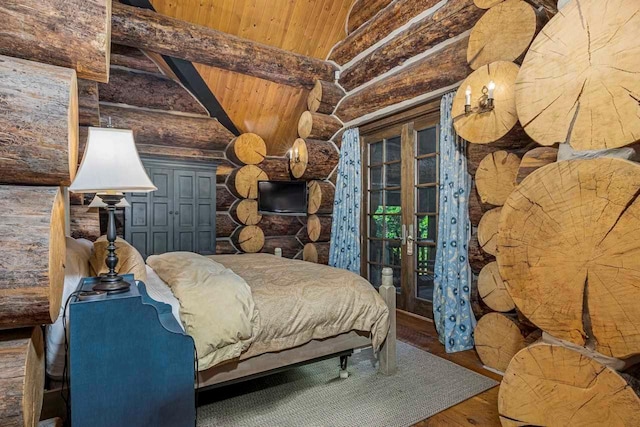 unfurnished bedroom with beam ceiling, log walls, wood ceiling, and hardwood / wood-style flooring