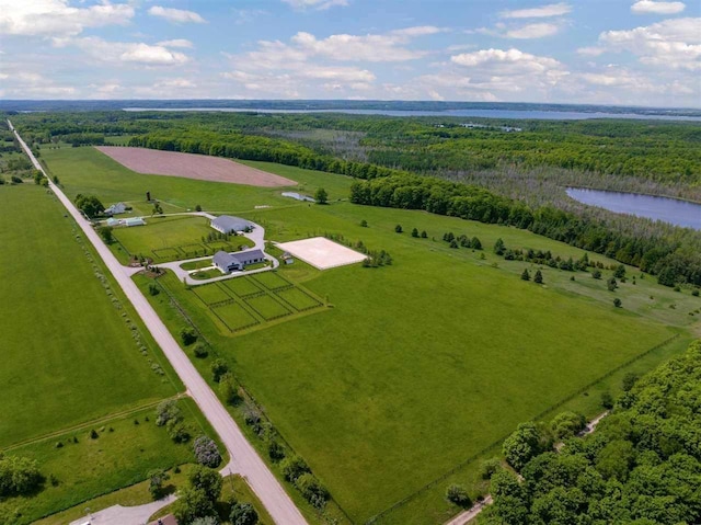 birds eye view of property with a rural view, a forest view, and a water view