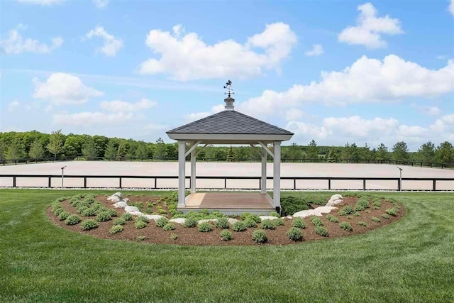 view of community featuring a gazebo and a lawn