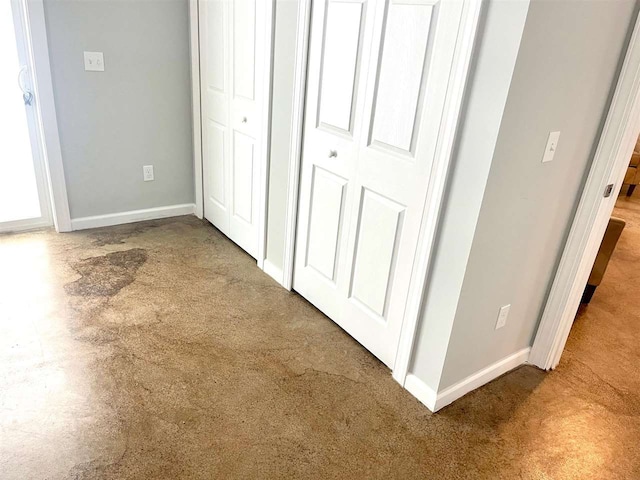 interior space with dark colored carpet