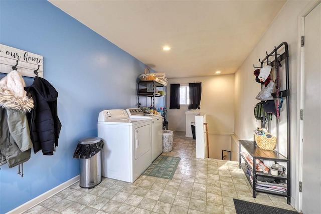 laundry area with washing machine and clothes dryer