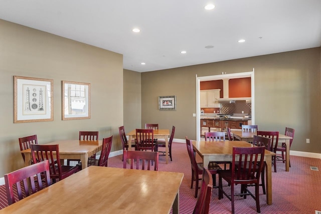 view of carpeted dining room