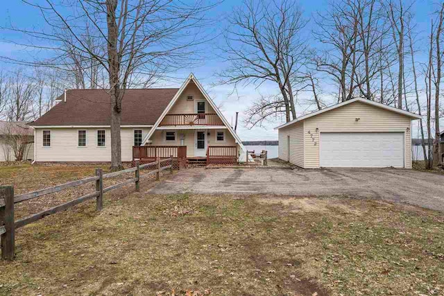 view of front of property with an outbuilding and a garage