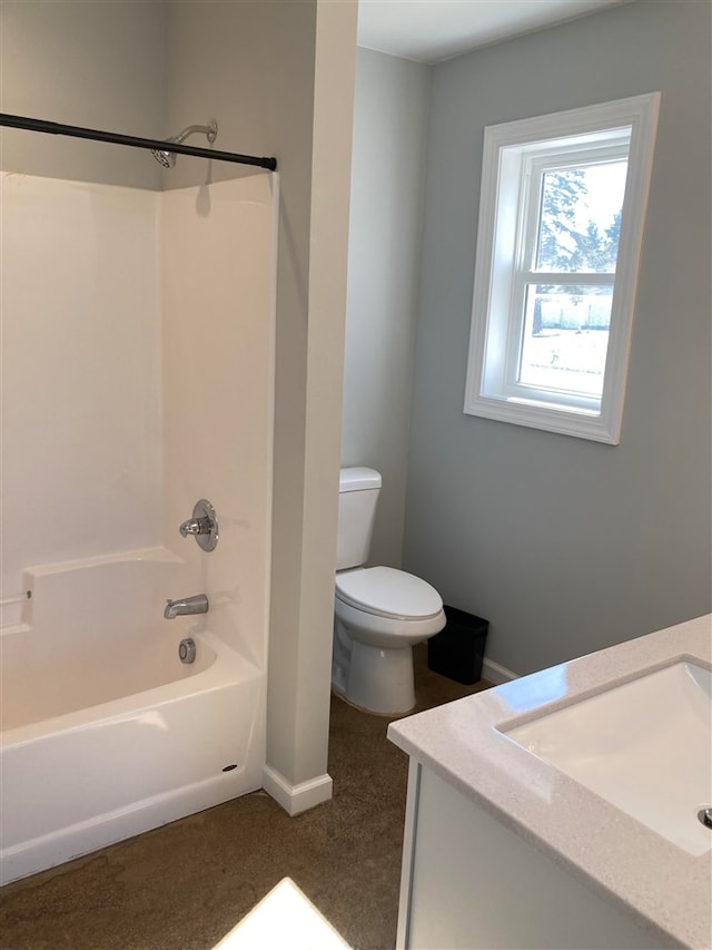 full bathroom with vanity, toilet, and washtub / shower combination