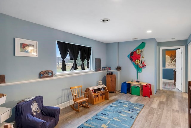 interior space with hardwood / wood-style floors