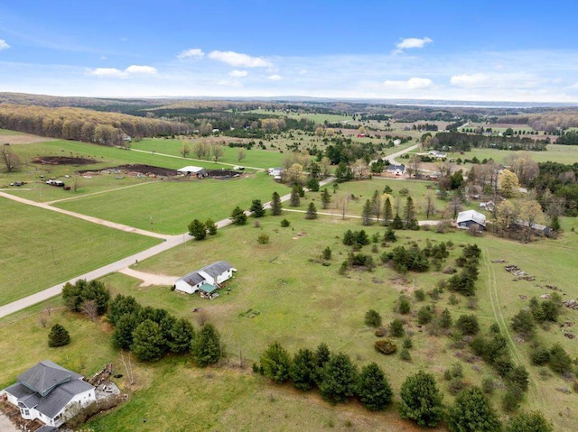 birds eye view of property featuring a rural view