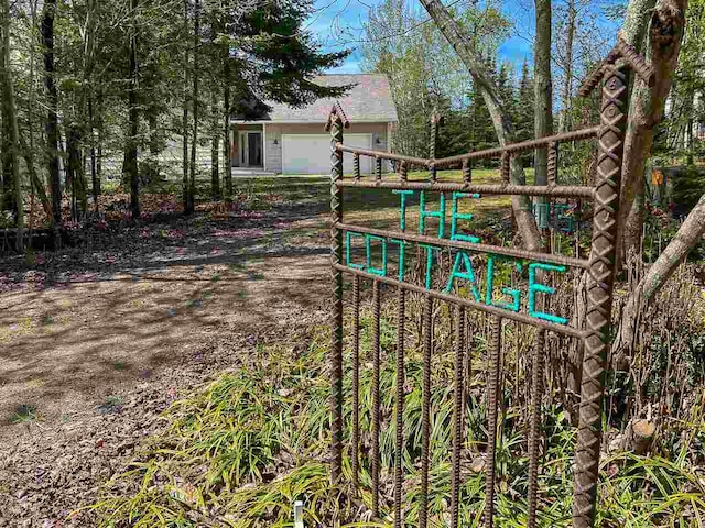 view of yard featuring a garage